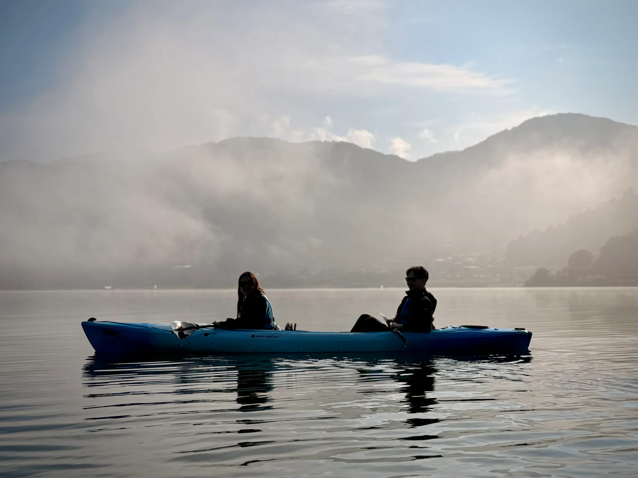 Customers kayaking in the mist